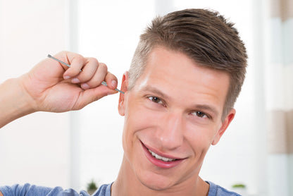 Ear cleaner with spoon